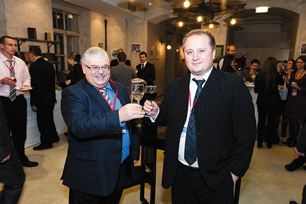 Игорь Фертман, председатель Совета директоров группы компаний, и Андреас Вайсбеккер, генеральный директор Intergraph PP&M, на праздничном фуршете